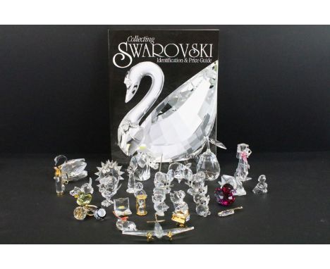 Selection of 30 Swarovski crystal ornaments to include animals, pear, hourglass, book, golf clubs, violin, piano, aeroplane, 