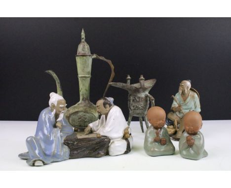 Collection of 20th century Chinese ceramic figurines depicting an old fisherman with rod and fish along with Mudman men playi