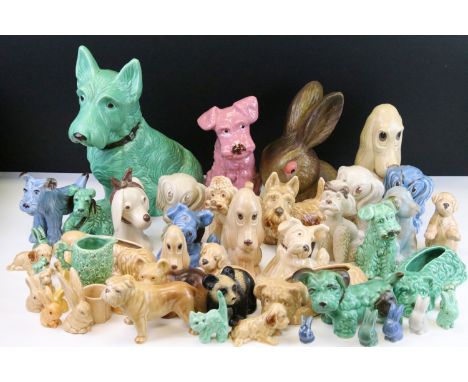 Assortment of vintage Sylvac ware figurines in varying colours including large green terrier 1209, large rabbit 1027, poodle 