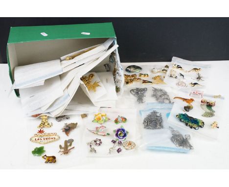 A large collection of ladies costume jewellery brooches to include vintage and contemporary examples. 