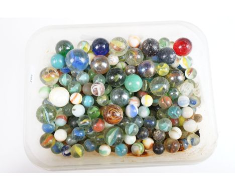 A collection of vintage marbles of various sizes and colours. 