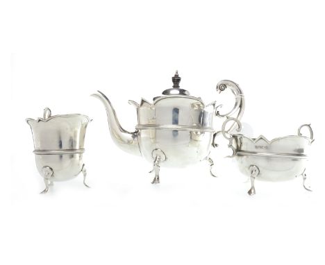 EDWARD VII SILVER THREE PIECE TEA SERVICEmaker Watson & Gillot, Sheffield 1902, comprising teapot, sugar and cream, each of c