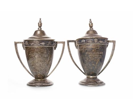 TWO MATCHED GEORGE V SILVER TROPHY CUPS OF SMALL PROPORTIONSmaker James Dixon & Sons Ltd., Sheffield 1934 and 1936, each of o