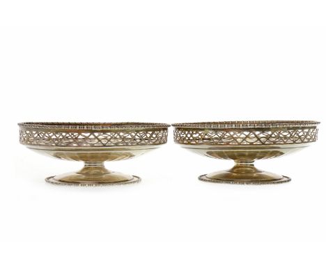 PAIR OF GEORGE V SILVER BONBON DISHES maker Adie Brothers Ltd., Birmingham 1932, each of circular form with pierced border an