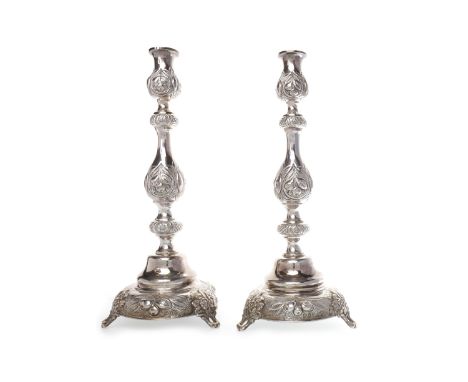 PAIR OF GEORGE V SILVER CANDLESTICKSmaker MS (?rubbed), London 1921, in the Baroque style, chased and embossed with scrolls, 