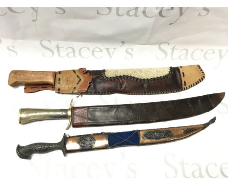 Three Swords including a German hunting knife (60cm long) and a Cuban souvenir machete (59cm long approximately). NO RESERVE