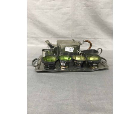 ARTS & CRAFTS PEWTER THREE PIECE TEA SERVICE together with four salt dishes