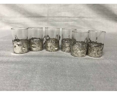 SIX DUTCH SILVER MOUNTED GLASSESalong with silver backed brush, button hooks, etc 