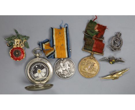 A WWI compass and two medals, together with lapel badges, etc.