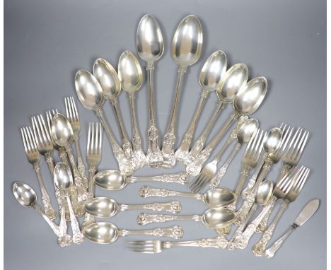 A matched 19th century and later King's pattern part service of silver flatware, various dates and makers, including a set of