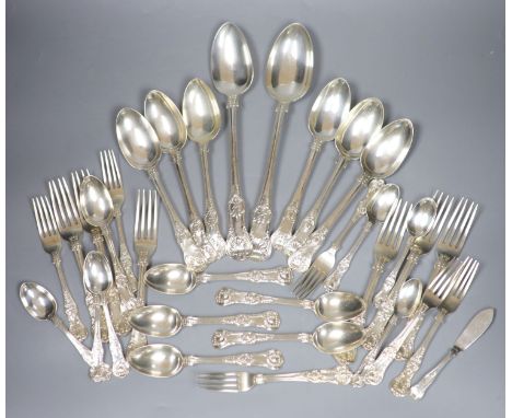 A matched 19th century and later King's pattern part service of silver flatware, various dates and makers, including a set of