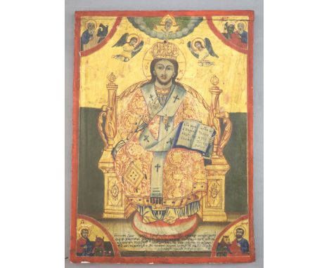 A 19th century tempera on panel icon, probably Russian, depicting Christ Pantocrator, inscribed and dated 1859 22.5 x 16.25in