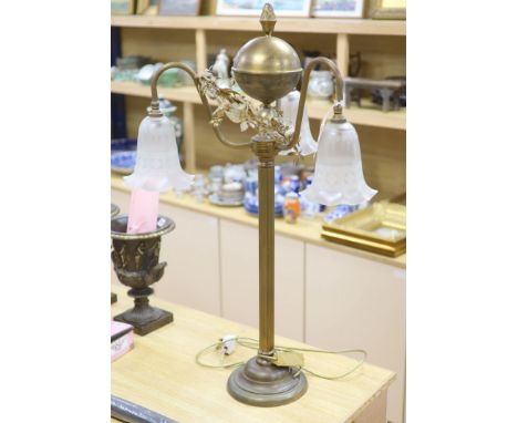 A gilt metal three branch lamp, height 92cm.
