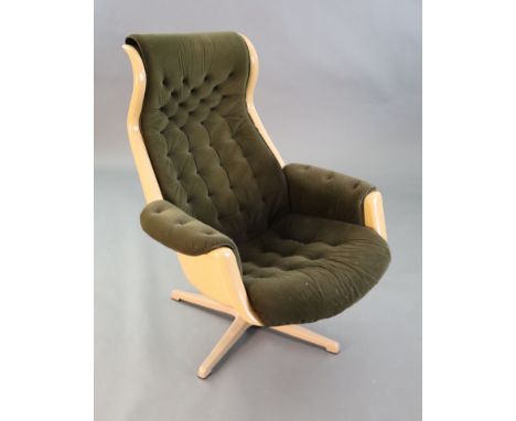 A Svensson and Sandstrom Swedish moulded plastic chair, upholstered in buttoned brown fabric with light tan coloured frame, c