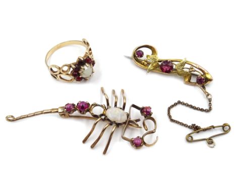 Victorian gold opal and pink stone set scorpion brooch, garnet flower brooch, both stamped 9ct and gold stone set ring, teste