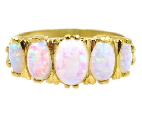 Silver-gilt five stone opal ring, stamped SIL Condition Report Click here for further images, condition, auction times & deli