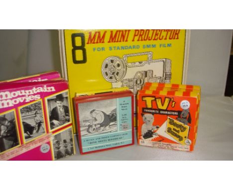 Vintage battery projector & assorted films