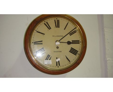 Vintage wall clock in oak case by R L Cozens of Taunton