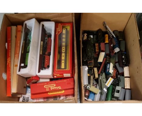 box of mainly OO gauge Triang model railway rolling stock in original boxes, one Mainline passenger coach, two rail section e