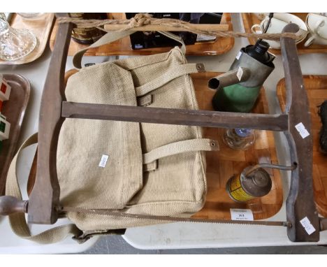 Military style webbing knapsack, Primus oil can, another vintage cycle lubricating can and and oil can, glass oil lamp and bo