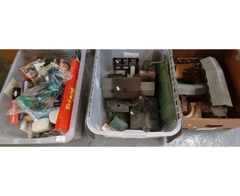 Three crates of assorted OO gauge model railway trackside accessories and related items, some in original boxes including: Ai