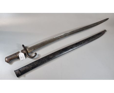 19th century French sword bayonet with fullered slightly curved blade, brass hilt and metal scabbard.  Bearing number 9231.  