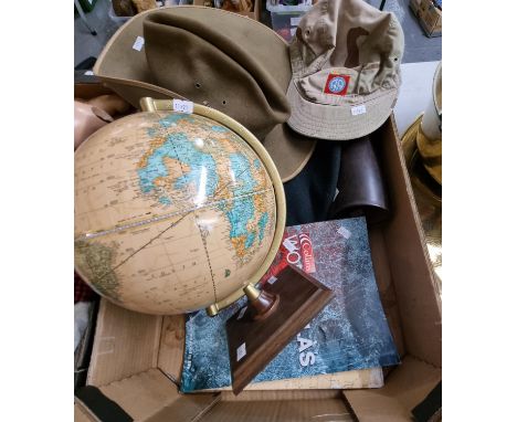 George F Cram table globe, various military and other hats, pair of leather gaiters and a Collin's world atlas.   (B.P. 21% +