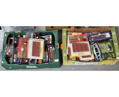 Two trays of assorted diecast model vehicles in original boxes, mainly buses, together with various model railway trackside a