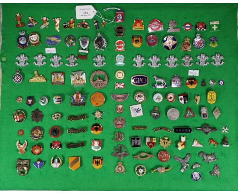 Collection of enamel badges and cap badges, military and others to include: S.W.B WWII bakelite plastic economy issue cap bad