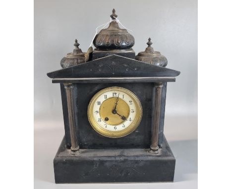 Early 20th century black slate two train architectural mantle clock, the case surmounted by minarets and having ceramic Arabi