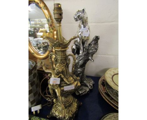CHERUB MOUNTED BRASS TWO-HANDLED LAMP TOGETHER WITH A FURTHER MODEL OF A LEOPARD ON A BRANCH 