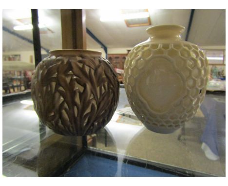 PAIR OF ROYAL WORCESTER EARLY 20TH CENTURY VASES, THE FIRST DOUBLE WALLED WITH AN OUTER RETICULATED FINISH, THE SECOND WITH A