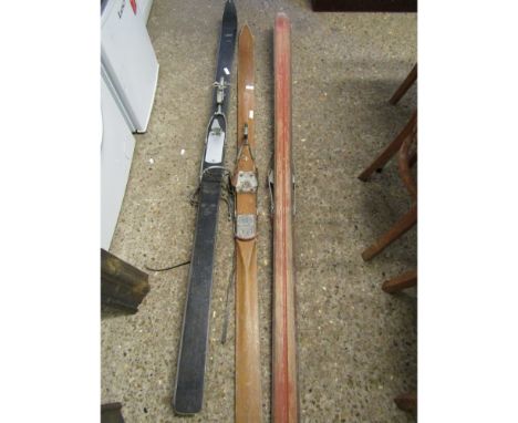 TWO VINTAGE SETS OF SKIS 