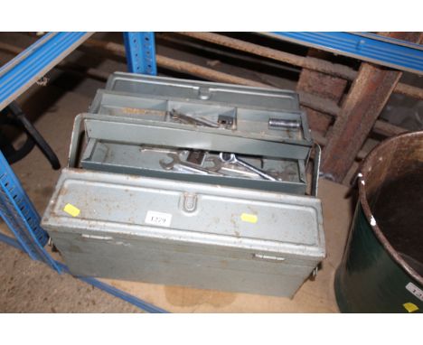 A metal cantilever tool box and contents of tools to include spanners etc.