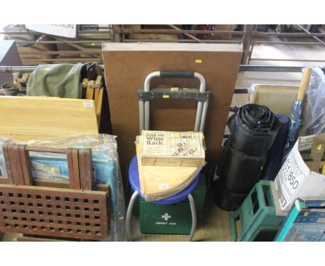 A wooden folding pasting table, a folding sack barrow, a self assembly add-on wine rack kit, two corner shelf kits, plastic s