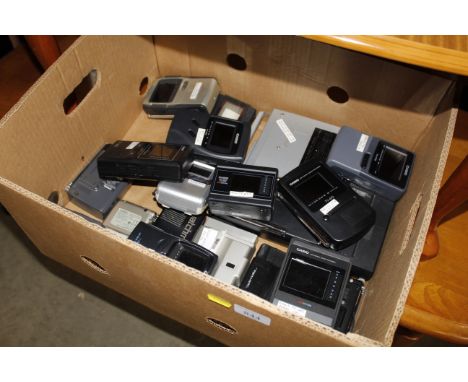A box of various novelty Casio and other transistor radios 