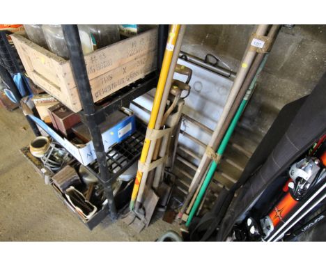 A quantity of long handled garden tools to include digging forks, spades, garden hoes etc.