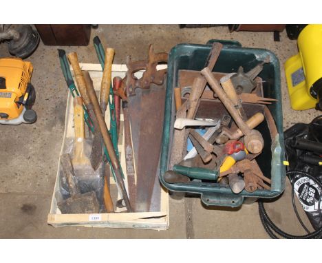 Two boxes containing various tools to include hand saws, shears, trowels, mallets etc.