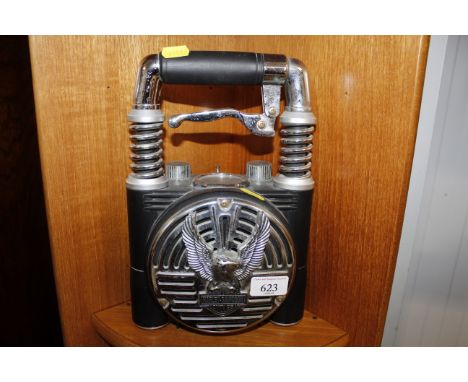 A novelty transistor radio in the form of a Harley Davidson