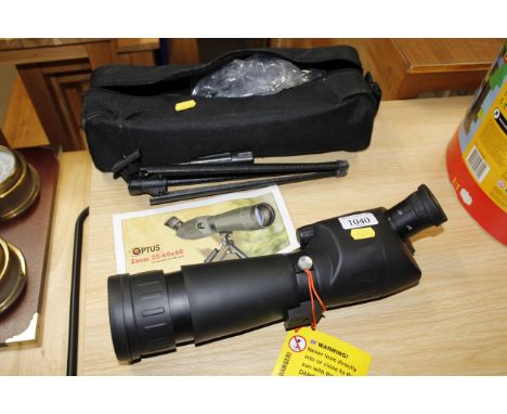 An Optus Zoom spotting scope complete with tripod and carrying box