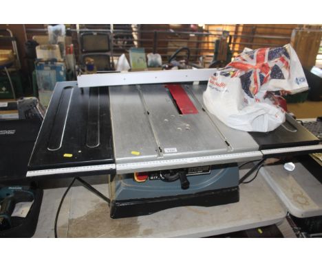 An Erbauer ERB2504SE 240v circular saw bench with legs (disassembled) and various parts