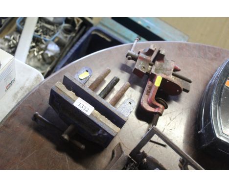 A Record 6" bench vice and a Record No.80 bench vice 