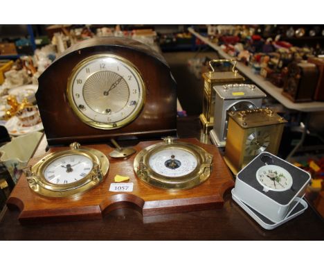 A clock and barometer set, three battery powered carriage clocks, chiming mantel clock etc.