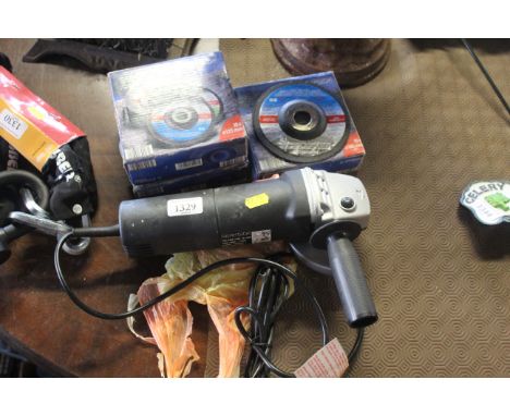 A Parkside 240v angle grinder with three boxes of Parkside 125mm cutting discs