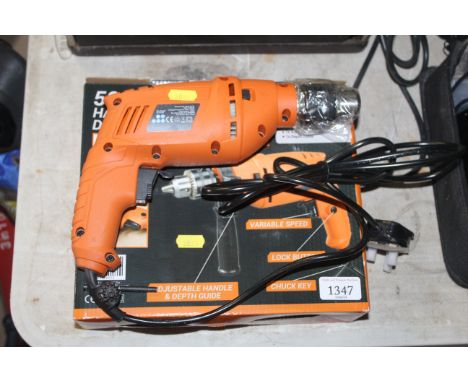 A Saber rotary hammer drill with original box