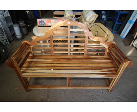A Lutyens style three seater garden bench
