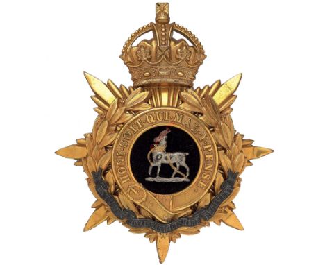 Badge. Royal Warwickshire Regiment Officer’s helmet plate circa 1902-14. A fine gilt example by J & Co. (Jennens).  Crowned s