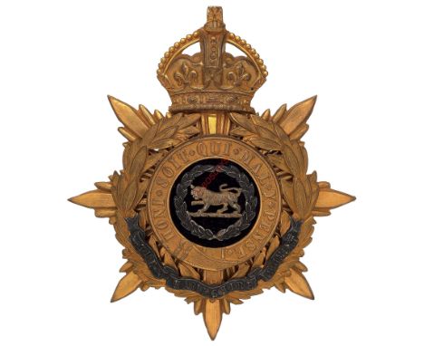 Badge. Hampshire Regiment Officer’s helmet plate circa 1901-14. A good gilt example converted whilst in service from a Victor