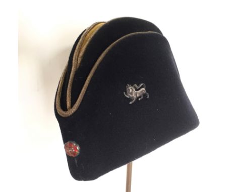 King’s Own Royal Regiment Officer’s sidecap. A good example by Christys’ of London based on the style of the Torin cap. Dark 