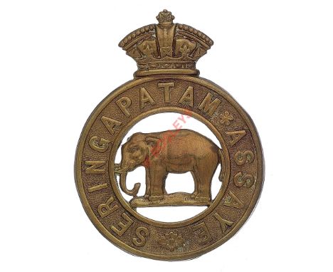 Indian Army. 8th Madras Native Infantry pre 1903 pagri badge. British made die-stamped brass Imperial crowned circlet “Sering
